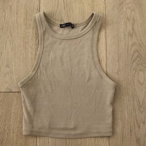 Cropped ribbed tank top. Pairs well with anything.